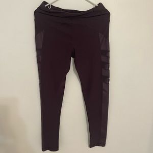 Purple workout leggings with mesh siding